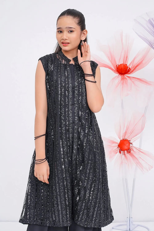 Black sequin sleeveless tunic for girls, stylish party wear with floral backdrop