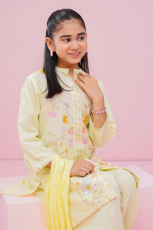Girl in light yellow embroidered kurta set, perfect for kids' fashion and special occasions.