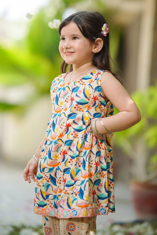 Little girl in colorful floral print sleeveless dress, perfect for kids fashion