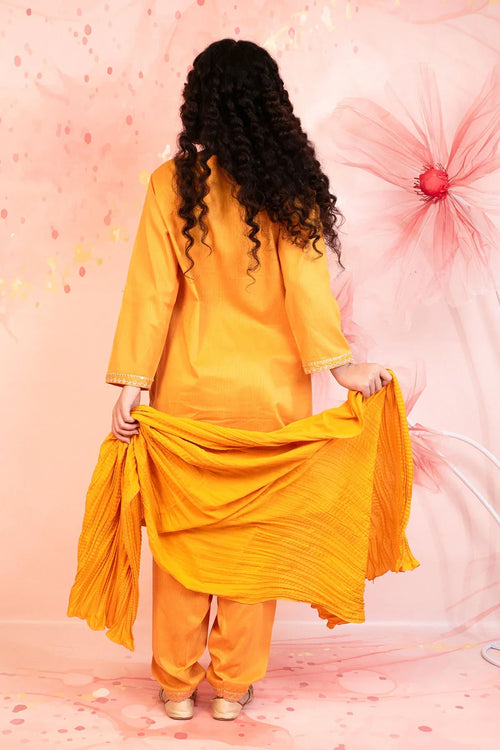 Vibrant yellow traditional outfit with matching dupatta, styled for women's fashion