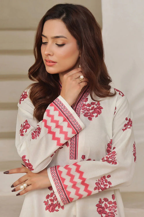White kurta with red floral print and zigzag sleeve design, stylish women's ethnic wear
