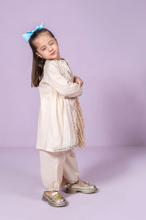 Little girl in floral embroidered cream kurta set with blue bow, perfect for kids fashion