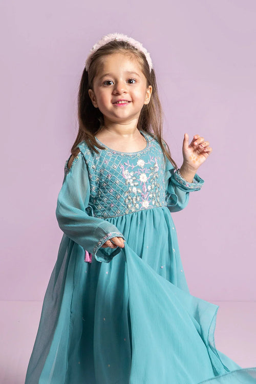 Adorable girl in turquoise embroidered dress with floral details, perfect for festive occasions.