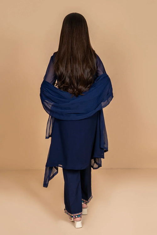 Navy blue women's kurta set with embroidered pants and sheer dupatta, back view