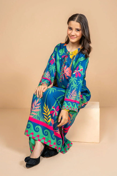 Girl in vibrant tropical print dress, perfect for kids fashion and casual wear