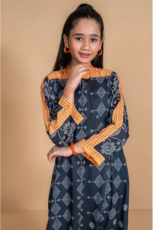 Girl wearing navy blue and orange patterned dress with geometric print, stylish kids fashion