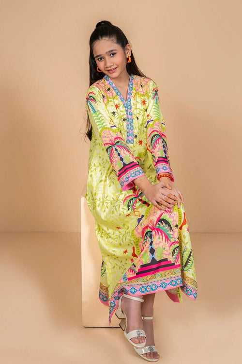 Girl wearing colorful printed kurta with palm trees, perfect for kids fashion and casual wear.