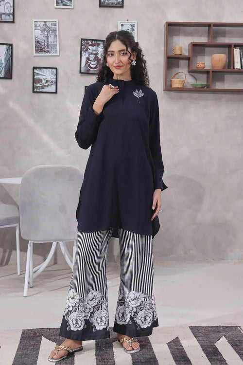 Find premium black printed suits for women at Ochre offering chic designs and fashionable daily wear styles
