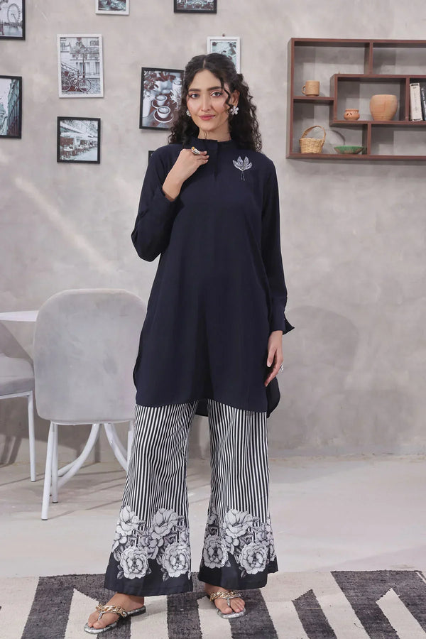 Find premium black printed suits for women at Ochre offering chic designs and fashionable daily wear styles