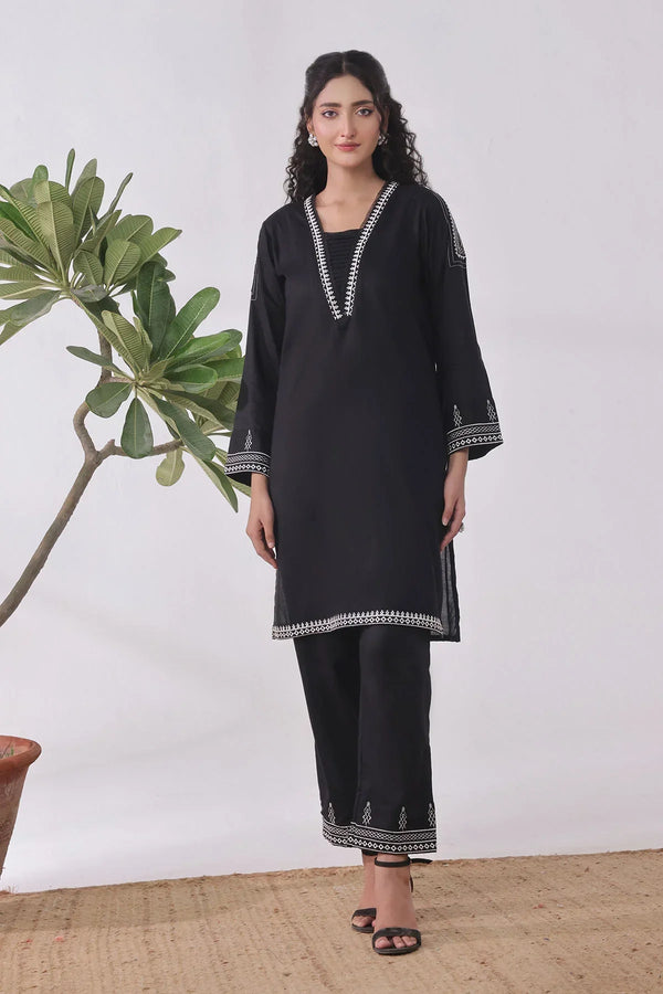 Discover stylish black and white suits & solo cotton designs for women.