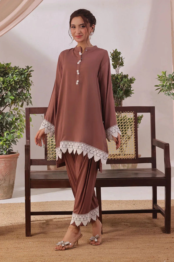 Upgrade your wardrobe with stitched Pakistani suits from leading ready to wear brands in Pakistan, perfect for casual